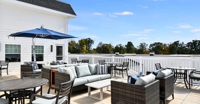 Outdoor seating area with patio furniture