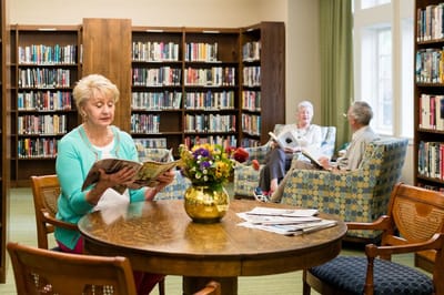 Residents enjoying time in a library area