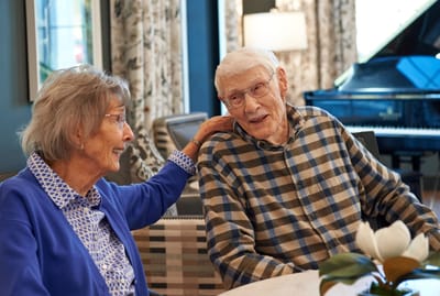 Residents enjoying conversation in a common area
