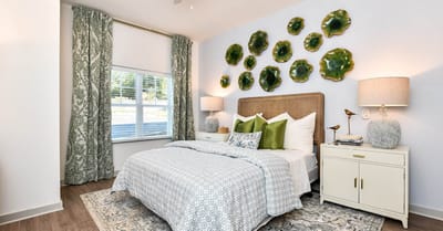 Well-decorated private resident room with floral accents
