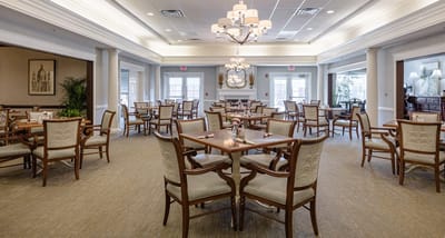 Bright dining room with wooden tables and chairs