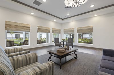 Bright common area with comfortable seating and natural light
