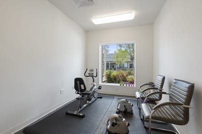 Interior fitness room with exercise equipment