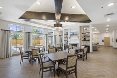 Interior common area with dining tables and seating