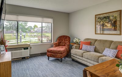 Bright common area with view of outdoor space