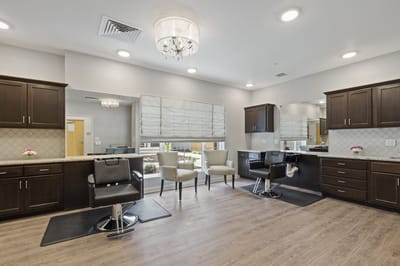 Interior view of a hair salon area with styling chairs