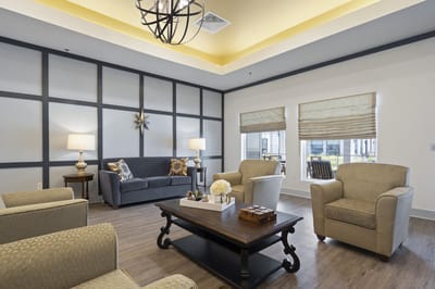 Bright common area with comfortable seating and natural light