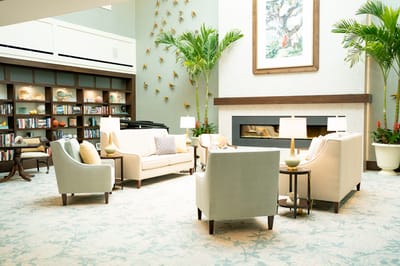 Bright common area with seating and decor