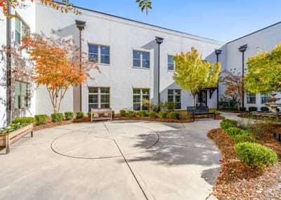 Courtyard with benches and colorful trees