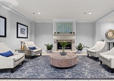 Cozy common area with comfortable seating and a fireplace