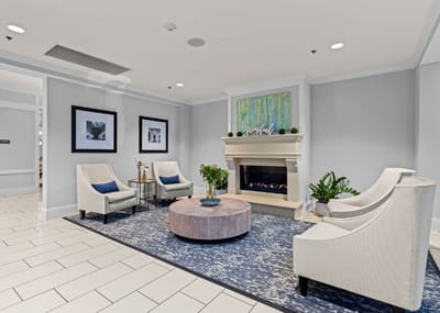 A bright common area with seating and decor
