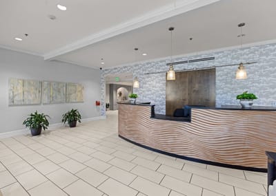 Bright and welcoming lobby area with reception desk