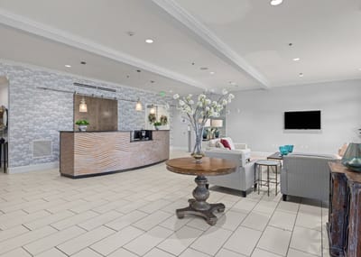 Bright interior lobby with reception area and seating