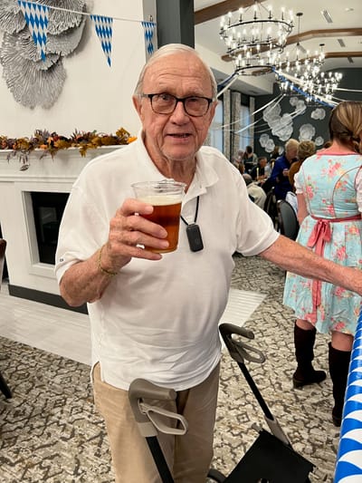 Resident enjoying a drink during a social event