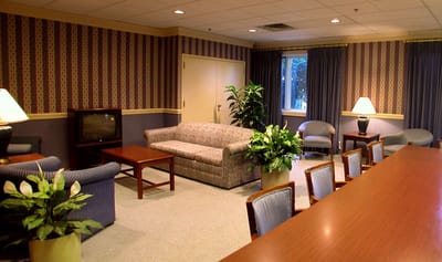 Interior view of a cozy common area with seating