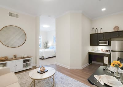 Bright interior of a private resident room with amenities