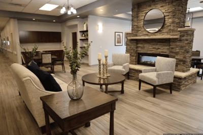 Interior common area with comfortable seating and fireplace