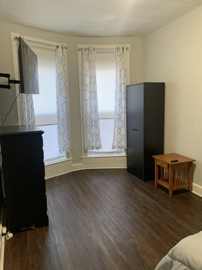 Interior view of a private resident room with furniture