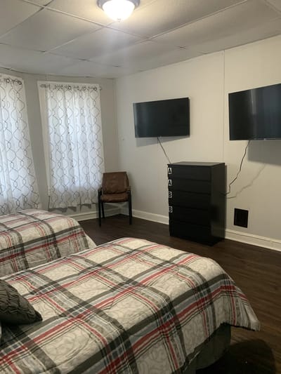 Interior view of a resident bedroom with two beds