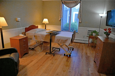 Cozy private resident room with wooden furniture