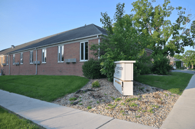 Exterior view of Goldwater Care with landscaping