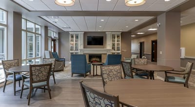 Interior common area with seating and fireplace