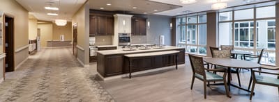 Interior common area with kitchenette and seating