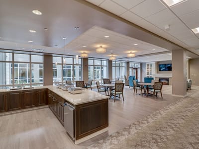 Spacious common area with seating and natural light