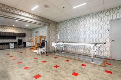 Interior view of a therapy room with equipment