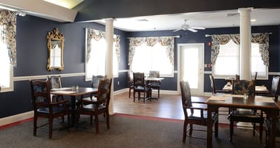 Interior dining area with tables and chairs