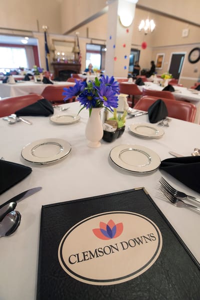 Dining setup featuring the Clemson Downs logo