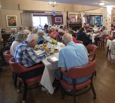 Residents enjoying lunch in the dining room