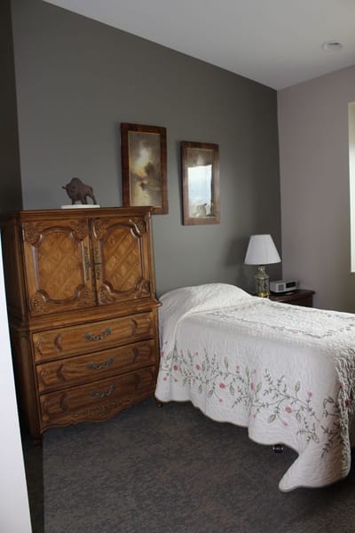 Private bedroom with antique furniture and decor