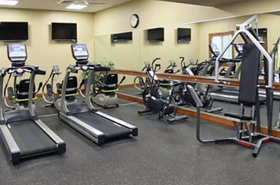 Interior view of a fitness area with equipment
