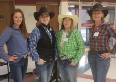 Staff members dressed for a themed event