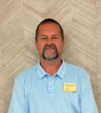 Staff member posing for a portrait