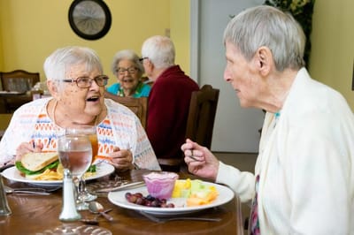 Residents enjoying lunch in the dining room