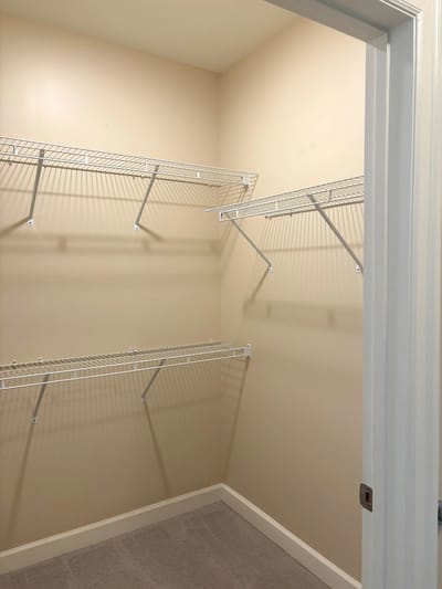 Empty closet space with shelving