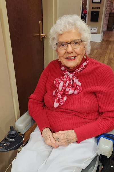 Happy resident in a cozy interior setting