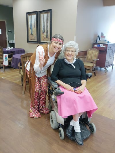 Staff member with a resident in a common area
