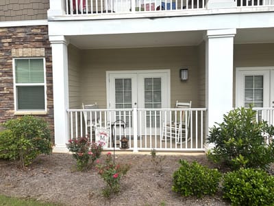 Outdoor view of a private balcony with seating