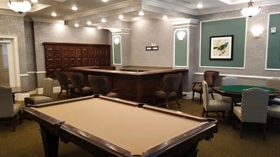 Interior view of a common area with a pool table