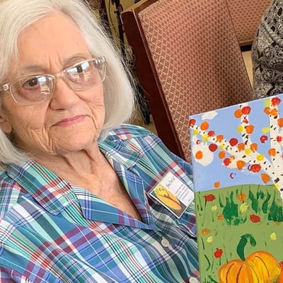 Resident participating in an art activity