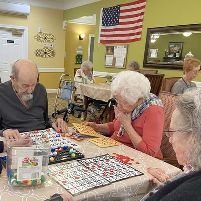 Residents engaging in a lively game of bingo in the activity room