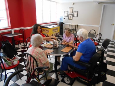 Residents engaging in a bingo game activity