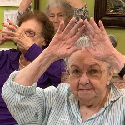 Residents joyfully participating in an activity