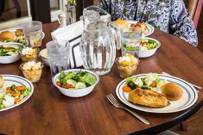 Colorful plates of food on a dining table