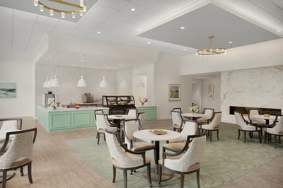 Bright dining area with tables and chairs
