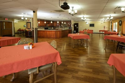Empty dining room with tables set for meals
