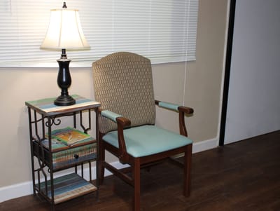 Cozy interior corner with a lamp and chair